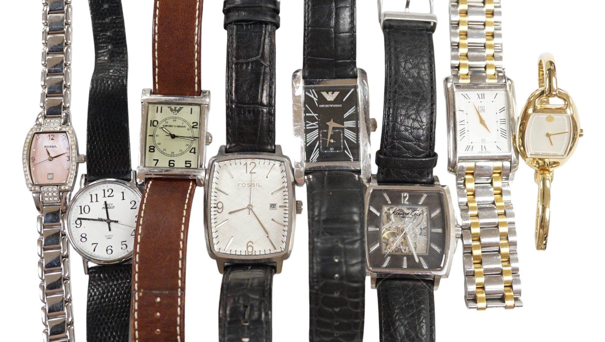 Eight assorted lady's and gentleman's modern wrist watches including Emporio Armani, Esq and Fossil. Condition - poor to fair